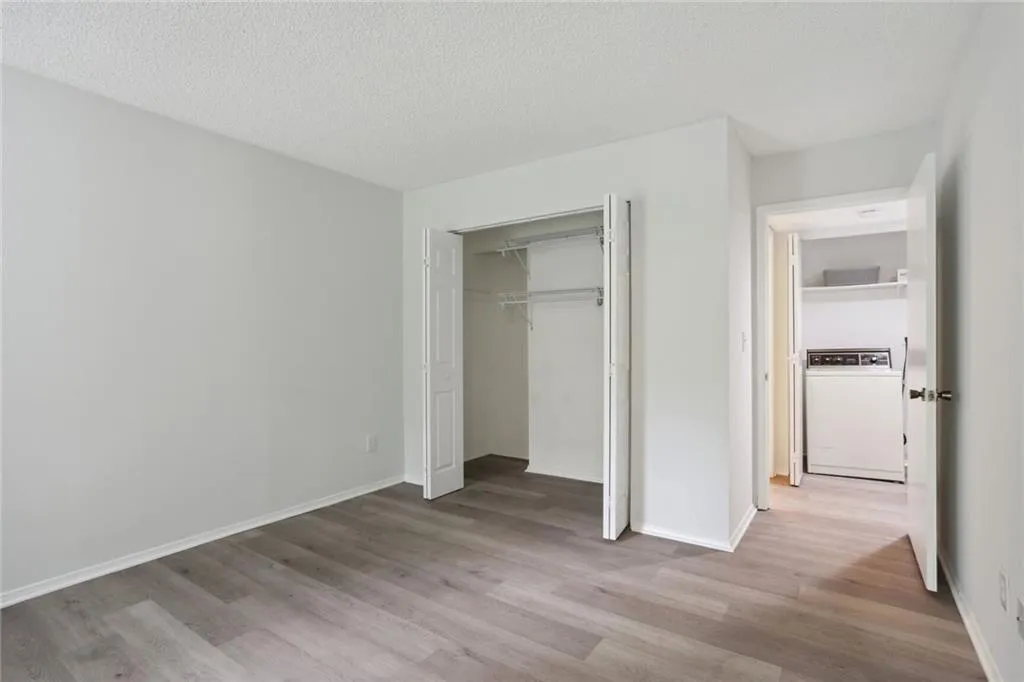 Bedroom with easy access to bathroom or laundry!