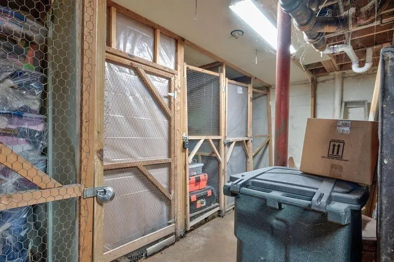 View of dedicated/individual storage area in basement of the building.