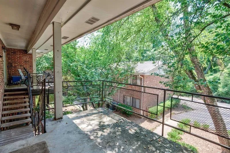 Covered patio is a short distance to the pool area.