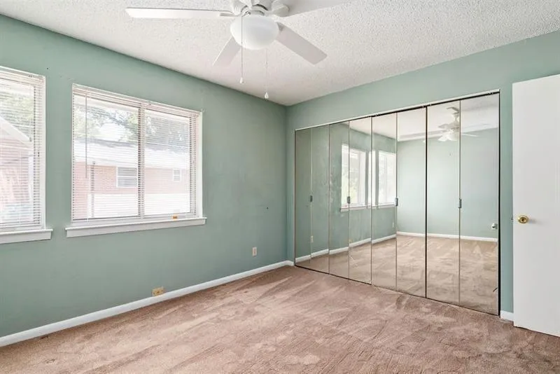 Primary bedroom with double closet space.