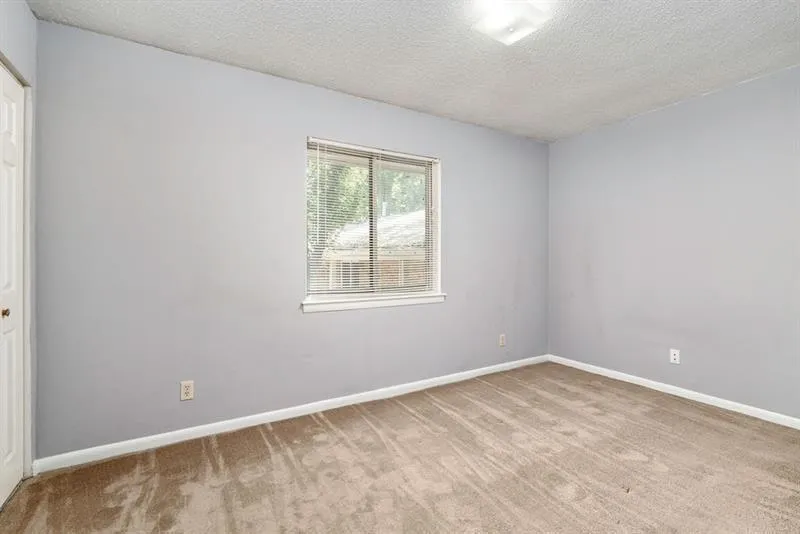 Second bedroom for roommate plan, guest bedroom or office space.