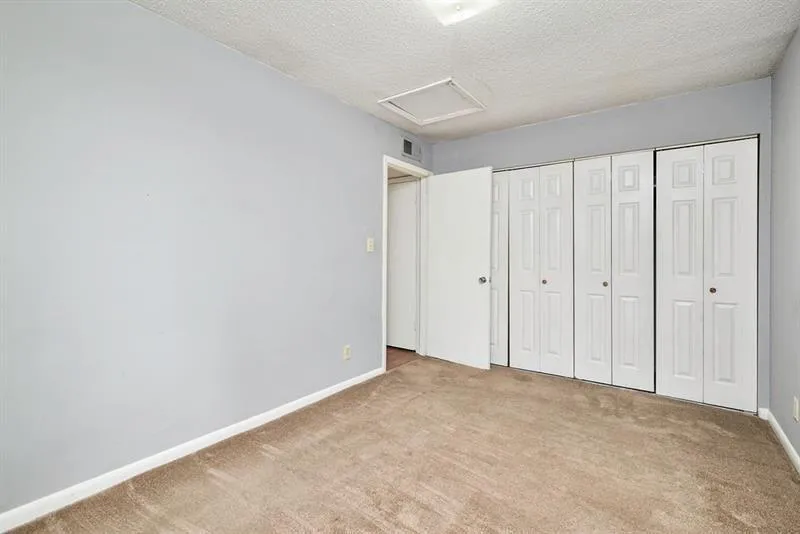 Second bedroom has double closet space.