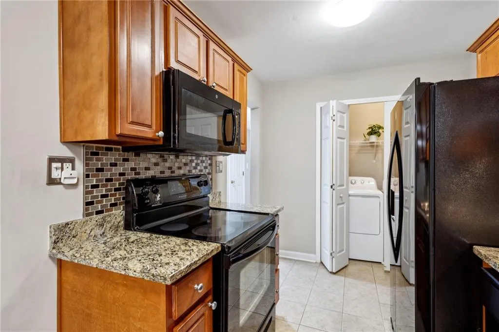 Notice Laundry Closet at far-end of Kitchen.  Washer & dryer included!