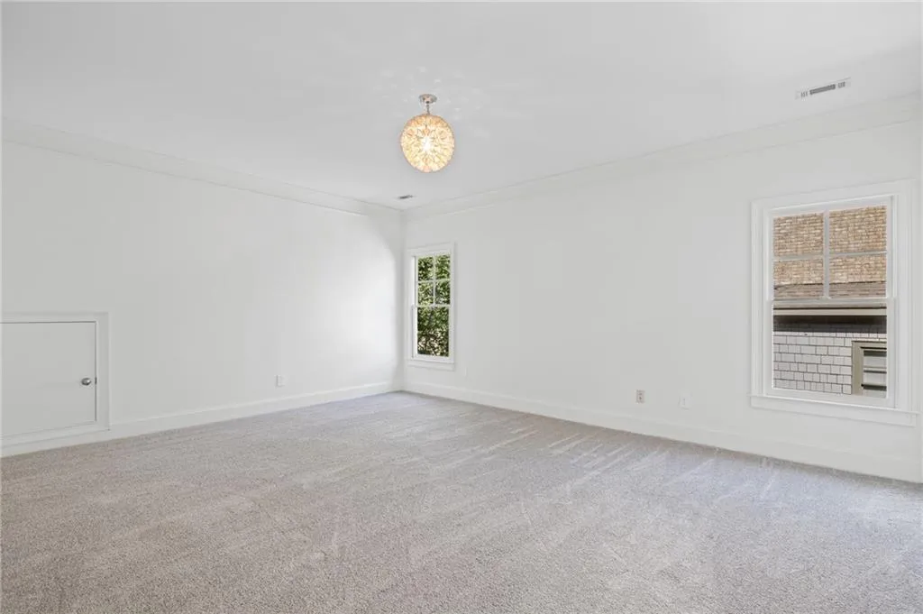 Secondary bedroom with ensuite bath and walk in closet