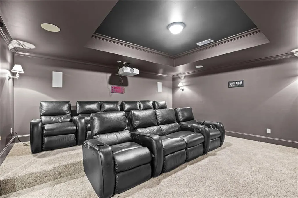 Home theater with projector, surround sound and 100' screen
