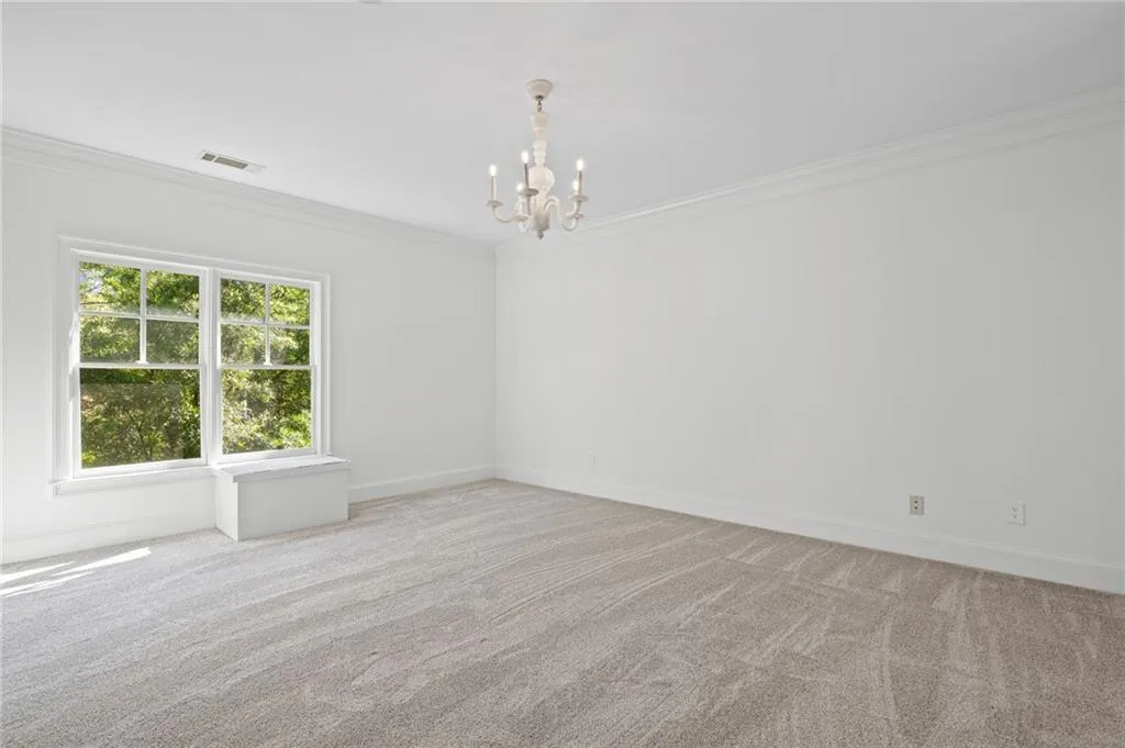 Secondary bedroom with ensuite bath and walk in closet