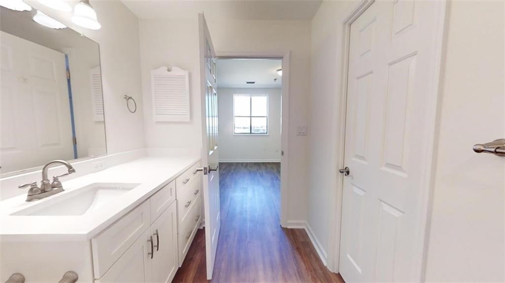 Bathroom featuring vanity and hardwood / wood-style flooring