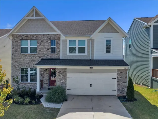 Brick and siding exterior with gabled roof lines