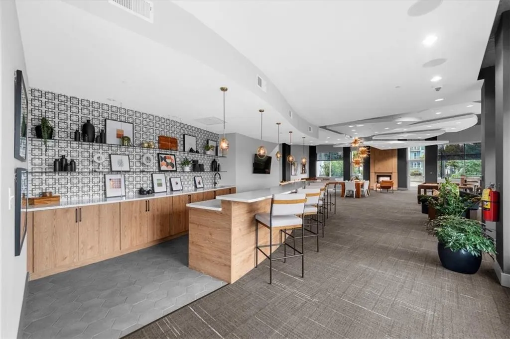 Community & Entertainment Room with Bar/Kitchen area.