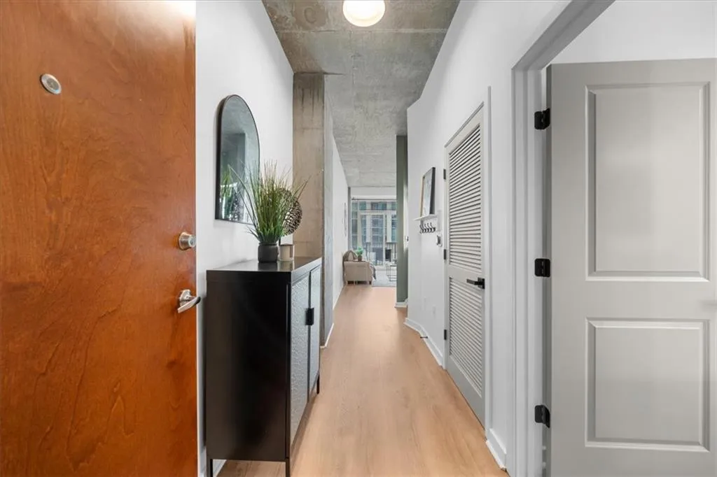 Entrance Hall featuring Brand new light oak color wide plank flooring