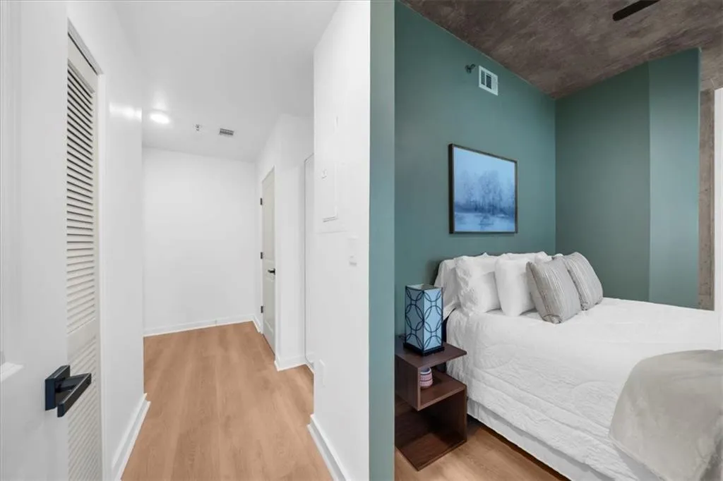 Hallway to laundry, closet, storage and bathroom