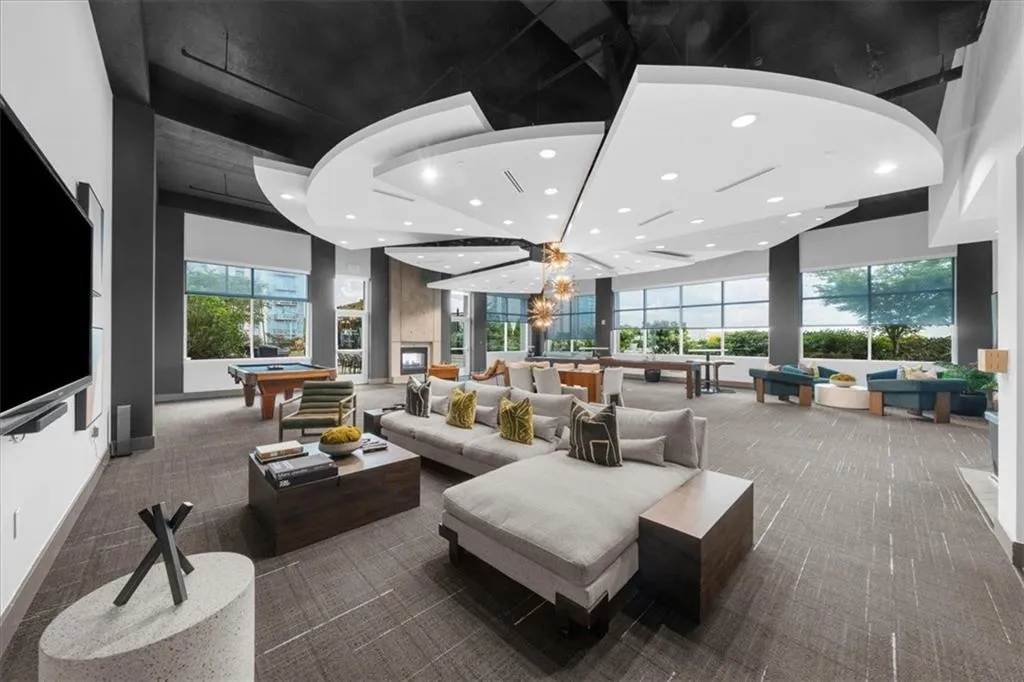 Community room & work center with views to rooftop pool