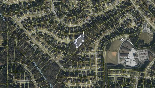 Plat Map. Illustrating the property's boundaries and its relation to surrounding parcels and infrastructure