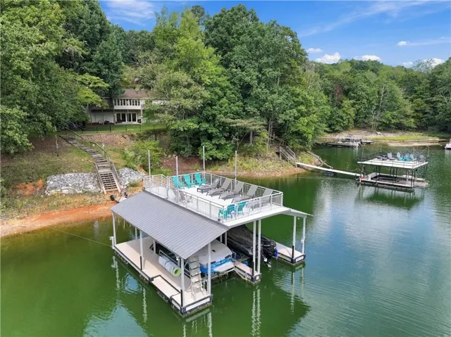 PRIVATE DOCK on DEEP water 2 boat slips with lifts, party deck, and tons of storage