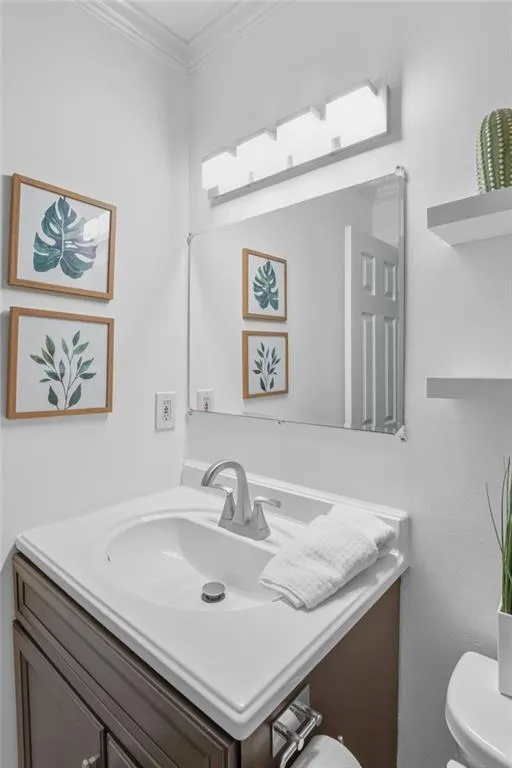 Bathroom recently renovated with walk in glass door shower, custom tile and new lighting