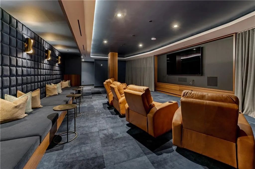 Home theater room with recessed lighting