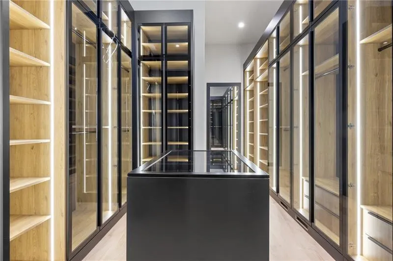 This closet is gorgeous! Completely custom. Every closet in the home is custom, and you have a second primary bedroom upstairs!