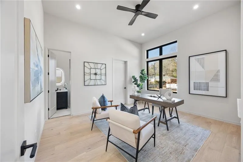 Office or bedroom on the main level with a full bath and custom walk in closet.