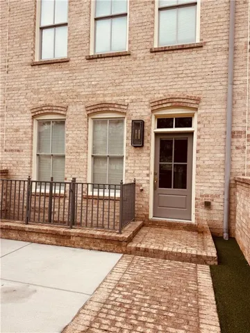 Brick facade with arched window details
