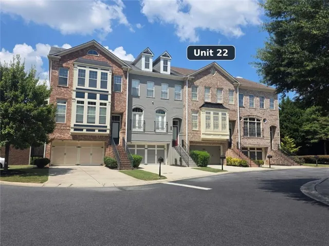 Brick facade with white trim accents
