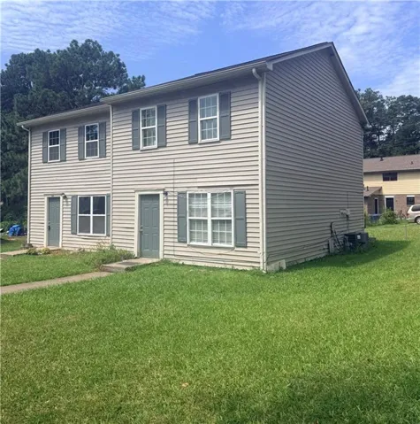 Two-story facade with horizontal siding