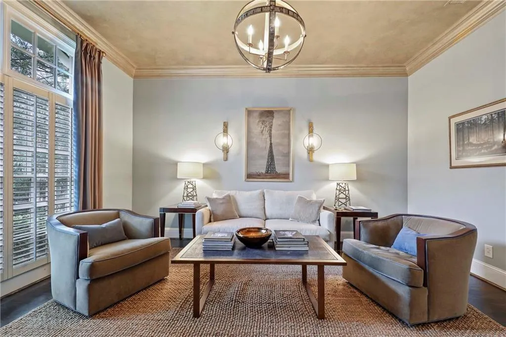 Currently used as a den, this front room on the main level is also a guest bedroom
