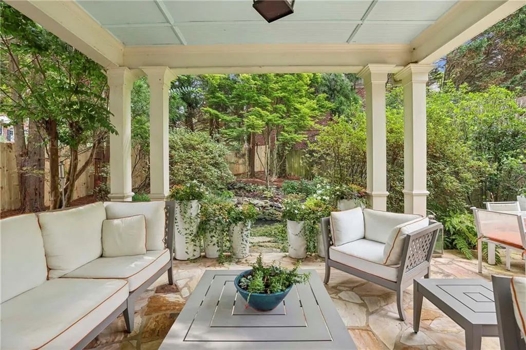 This covered back patio is your private oasis!