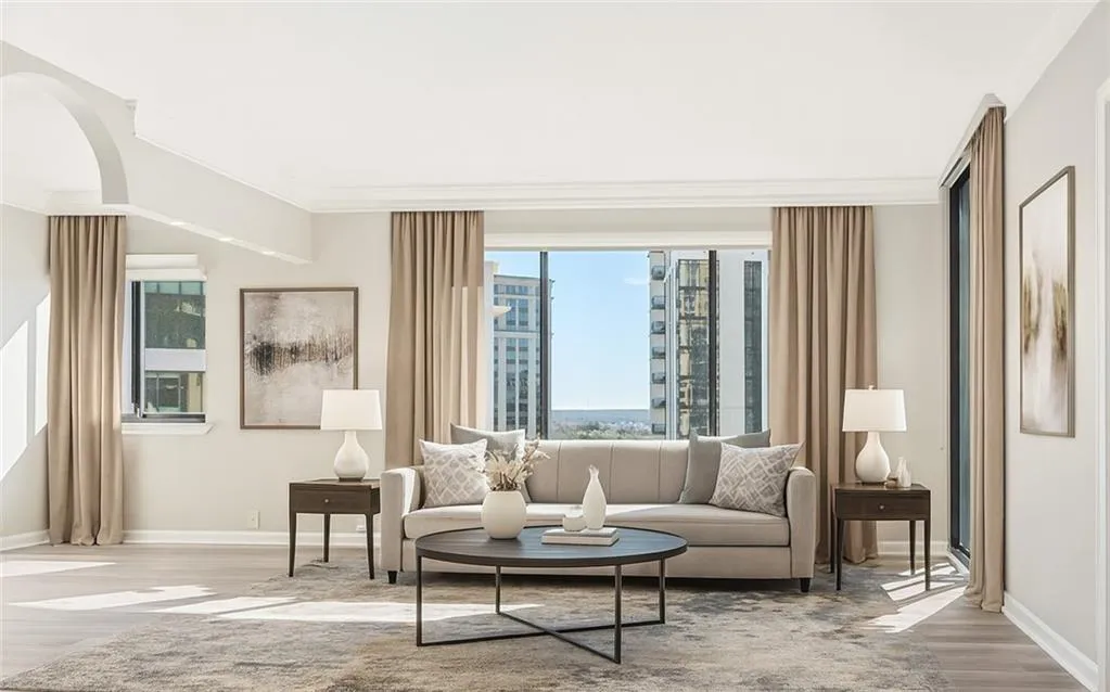 Spacious family room and dining area. Two balconies, new flooring, fresh paint, BRAND new HVAC system. Spacious family room and dining area. Two balconies, new flooring, fresh paint, BRAND new HVAC system.