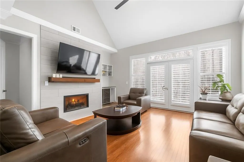 Gather in the spacious living room with a gas fireplace and custom dry bar — perfect for relaxing or entertaining. Gas for both the fireplace and cooking is included in your HOA, making comfort effortless.