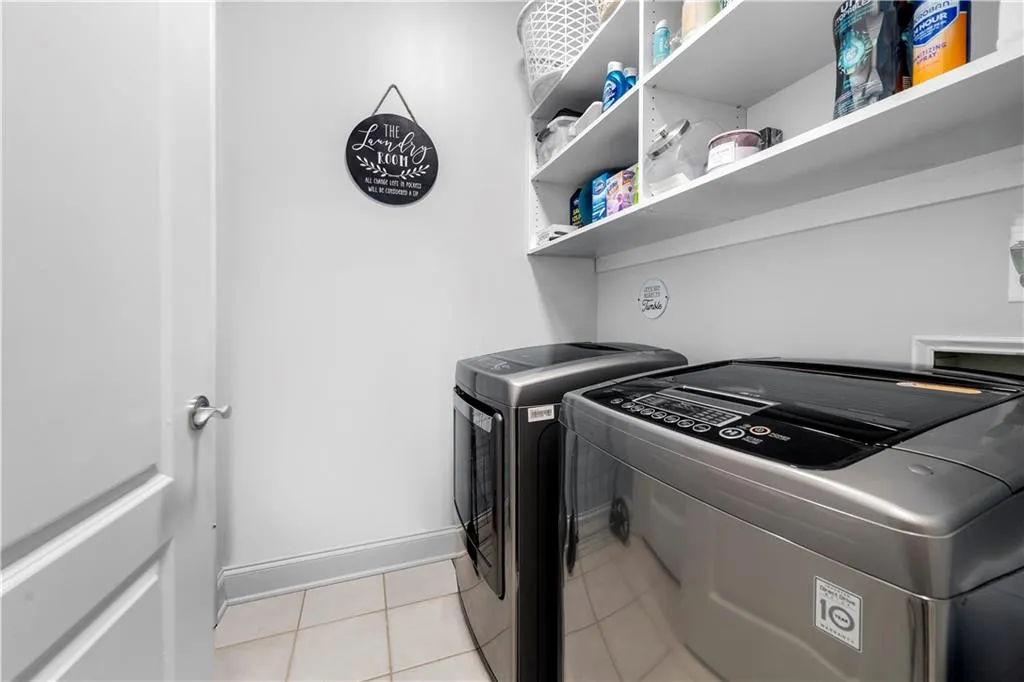 Conveniently located laundry room on the main level with ample shelving for storage making laundry day a breeze.