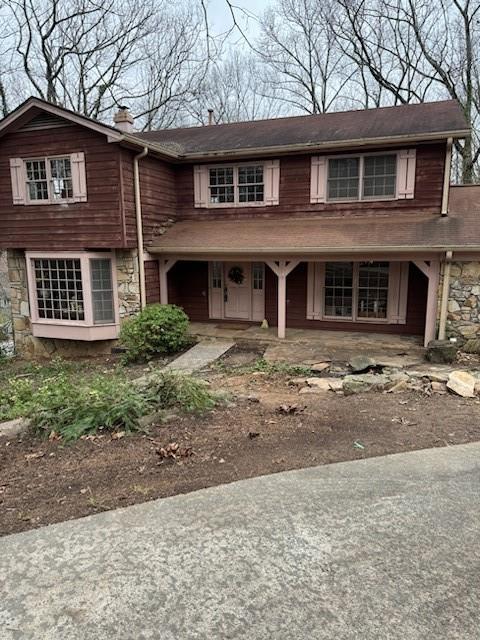 View of front of house featuring covered porch
