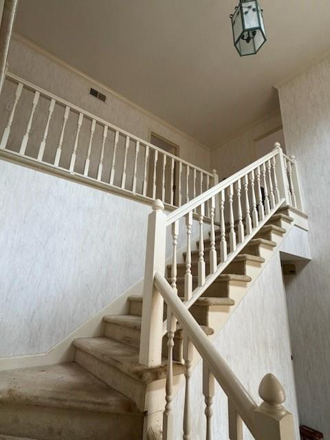Staircase with crown molding