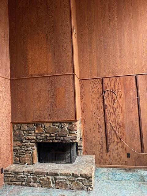 Two story FR with a fireplace in terrace level