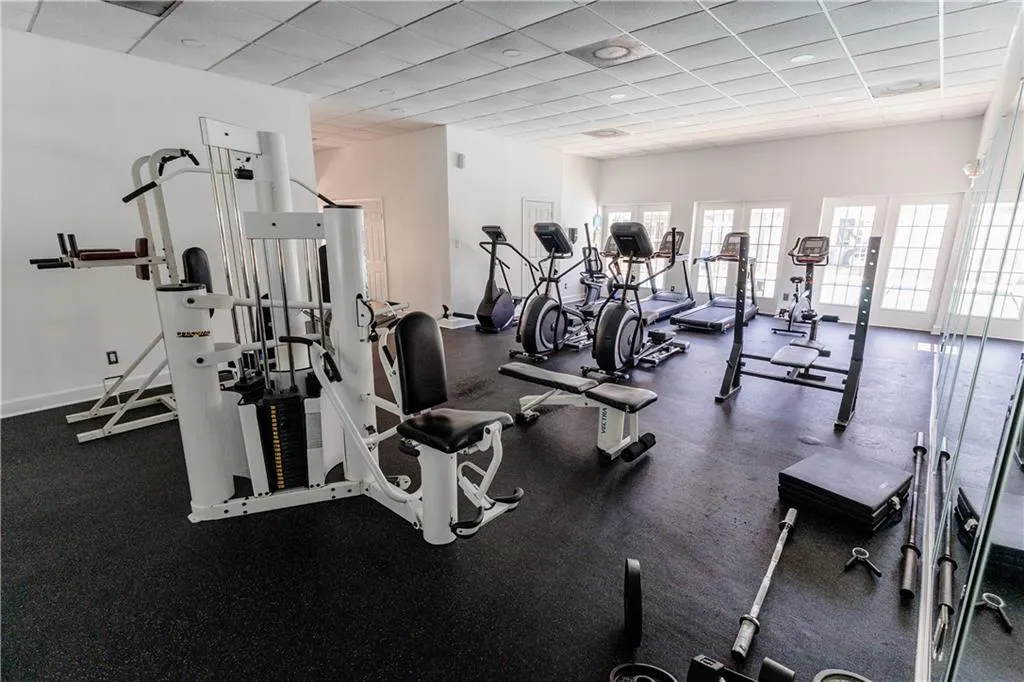 Gym featuring a paneled ceiling