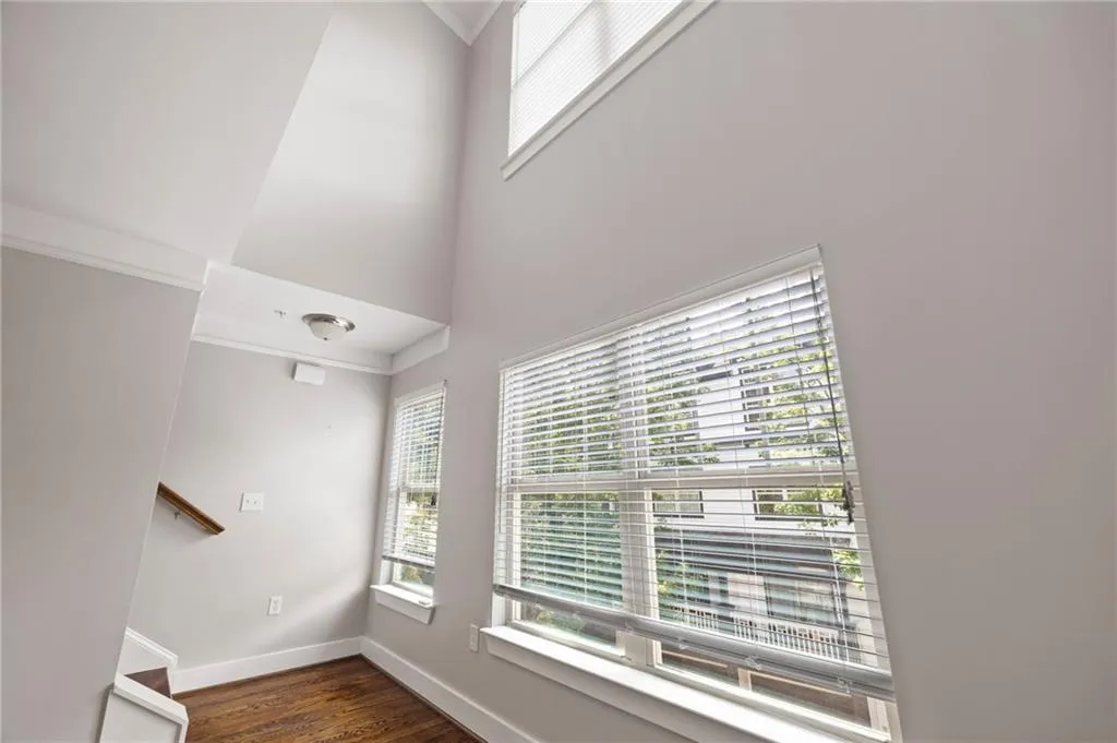 Vaulted ceiling allows a lot of light into the primary bedroom and loft areas.