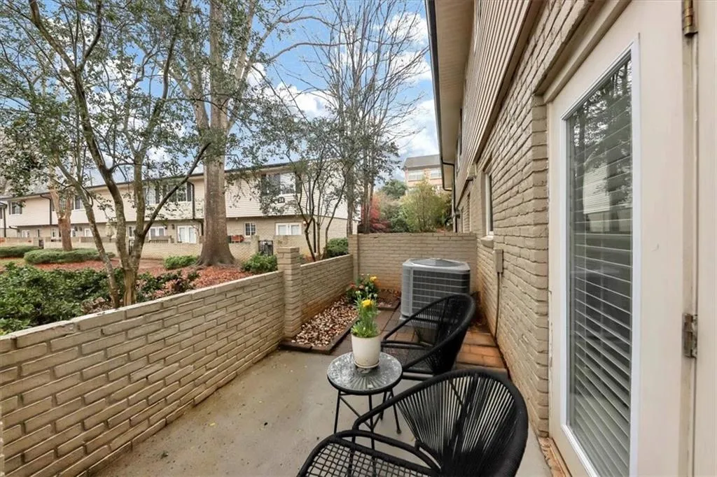 Balcony featuring a patio and central air condition unit