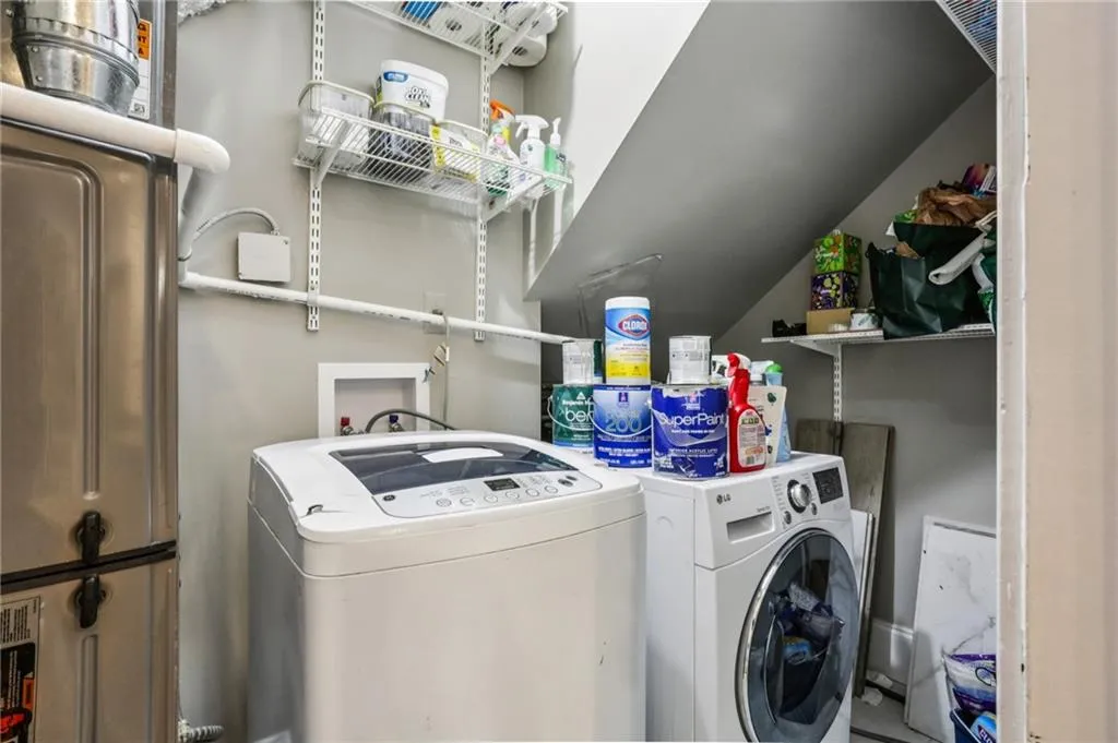 Laundry room with storage on main floor off kitchen