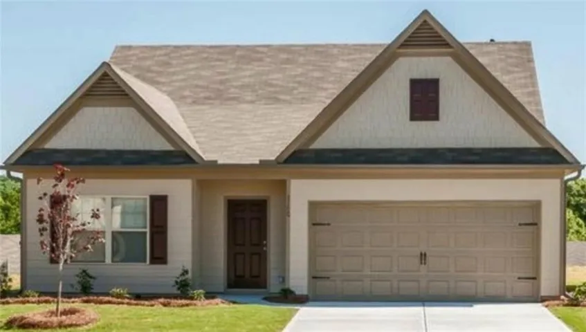 Craftsman-style facade featuring horizontal siding and twin gables