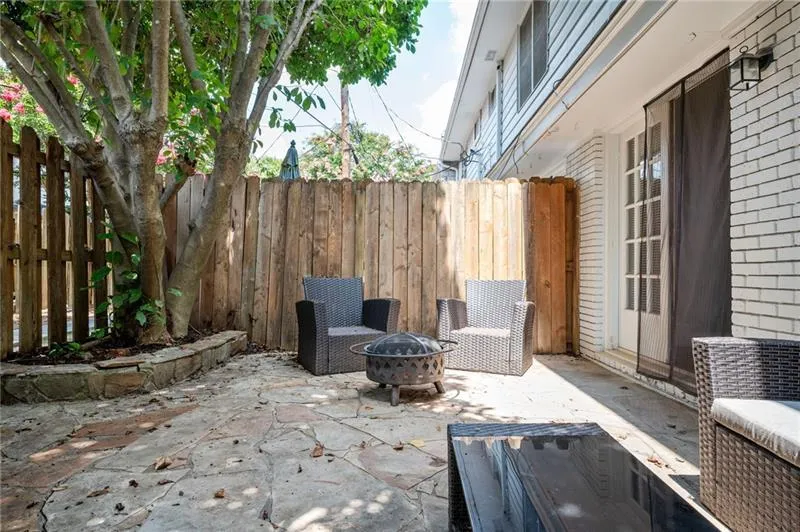 View of patio / terrace with an outdoor fire pit