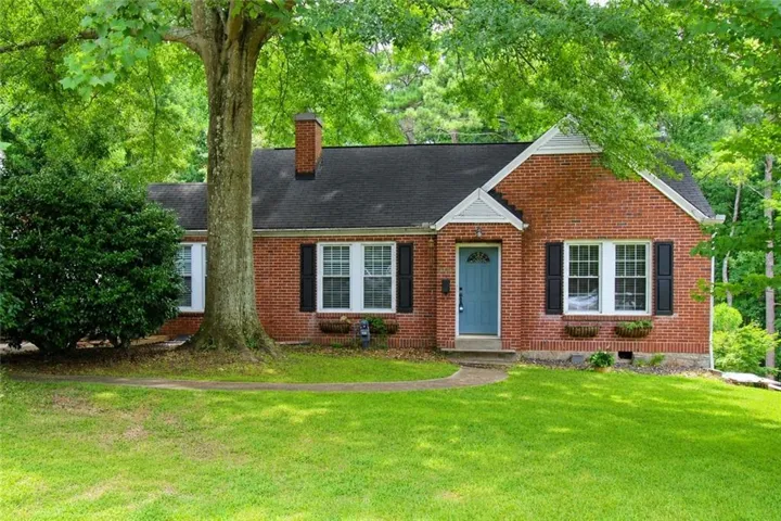 Welcome home to your spacious all brick bungalow!