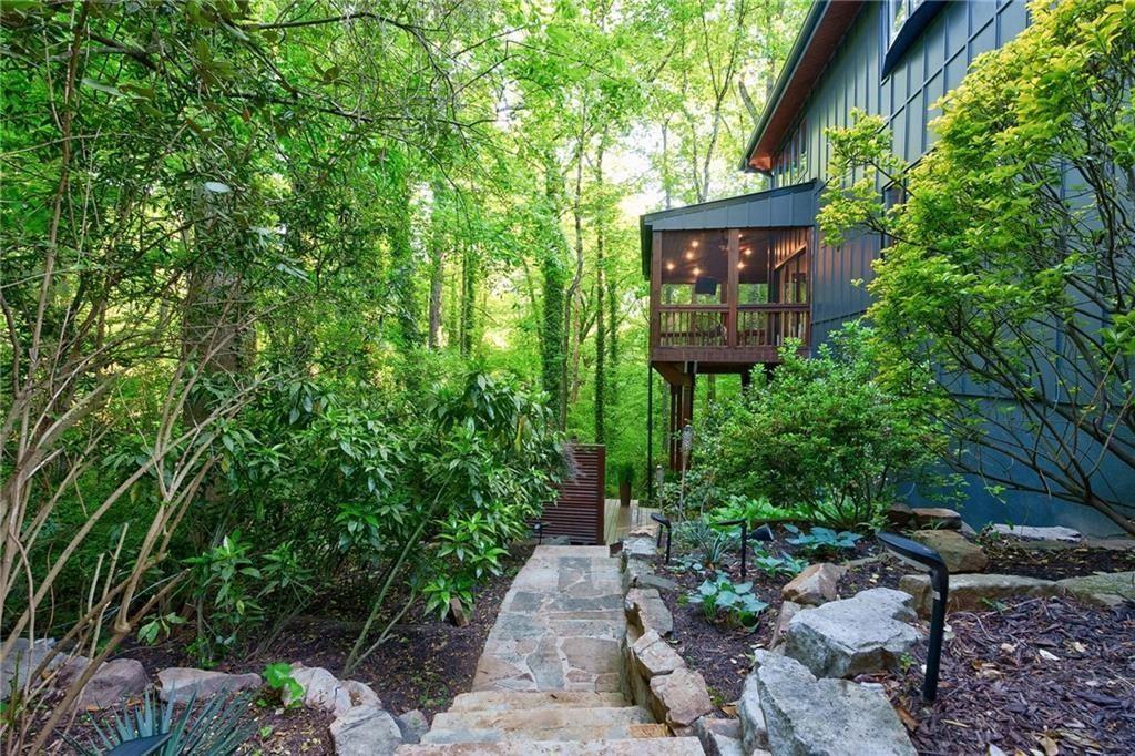 View of yard featuring a balcony