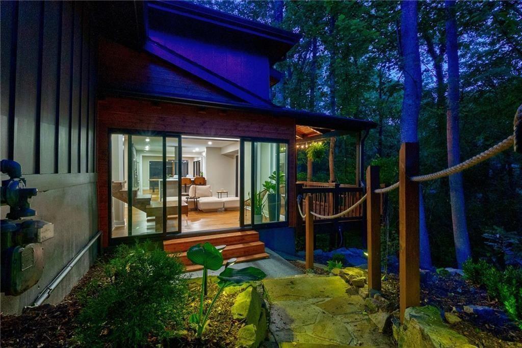 View of side of property with a deck