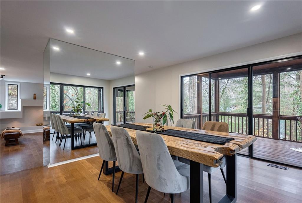Dining room with light hardwood / wood-style floors