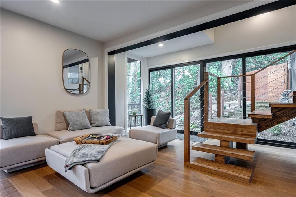 Living room with light wood-type flooring