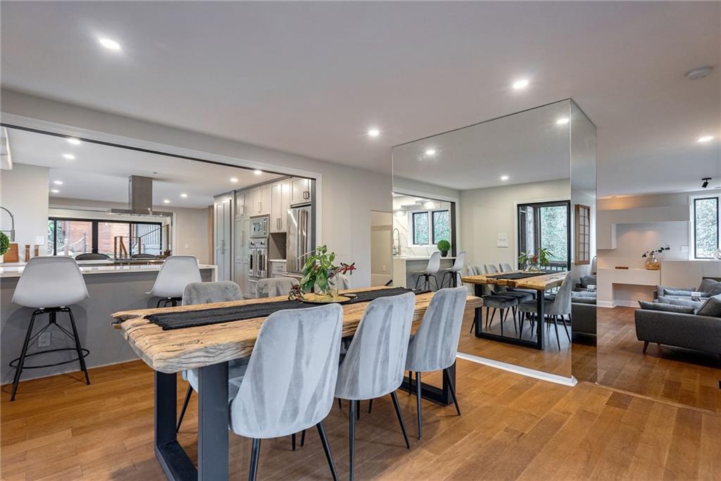 Dining area with light wood-type flooring