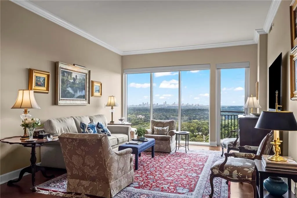 Expansive windows, crown molding, and wood-finish flooring