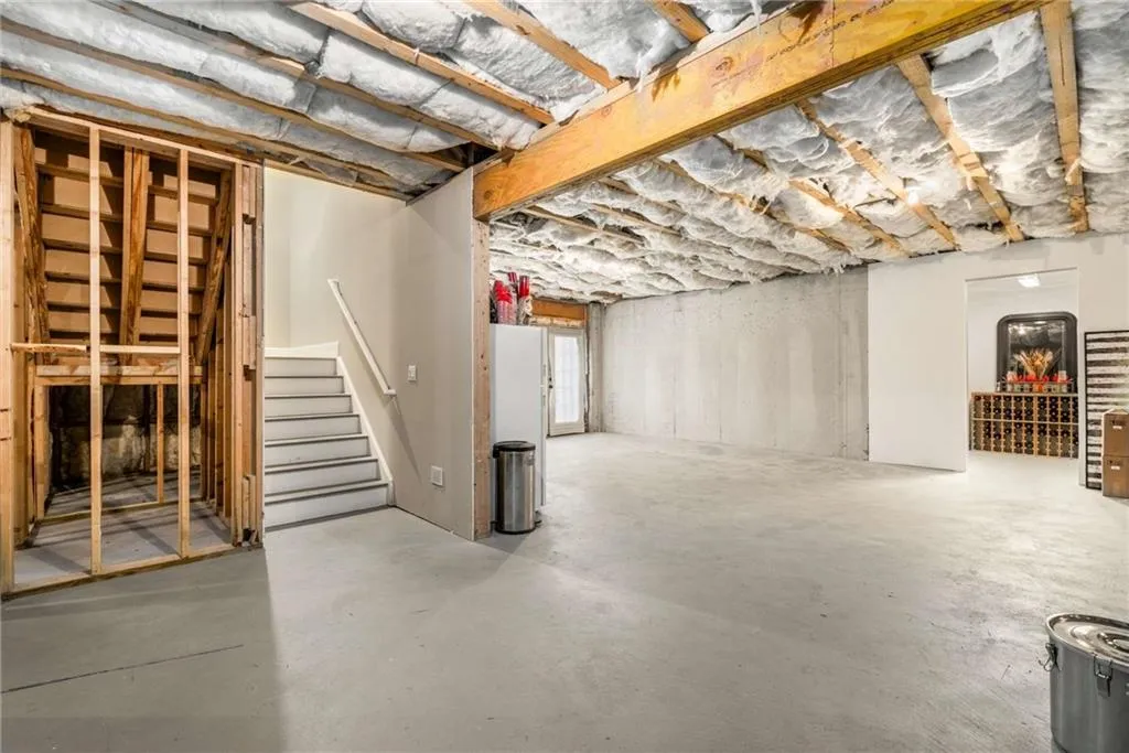 Below grade area featuring stairs