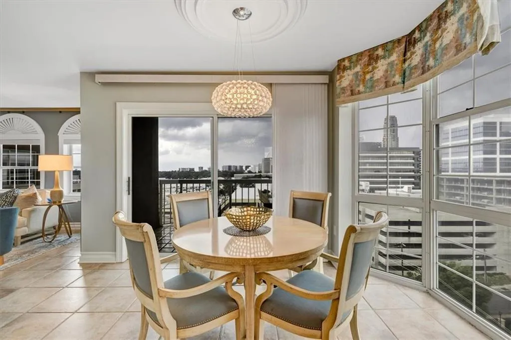 Floor-to-ceiling windows with motorized window treatments