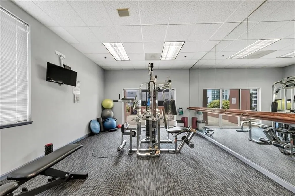 Weight gym to the left of elevators