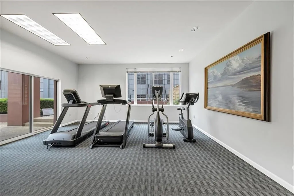 Cardio gym to the right of elevators
